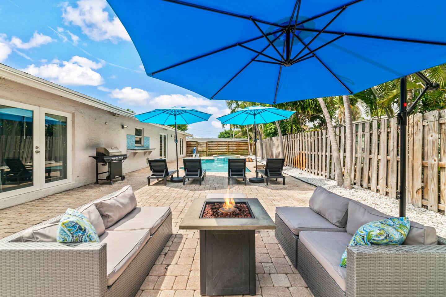 Enjoy a private outdoor oasis and dip in the pool, unwind in the relaxing hot tub, gather around the fire table and enjoy outdoor cooking with a BBQ grill.