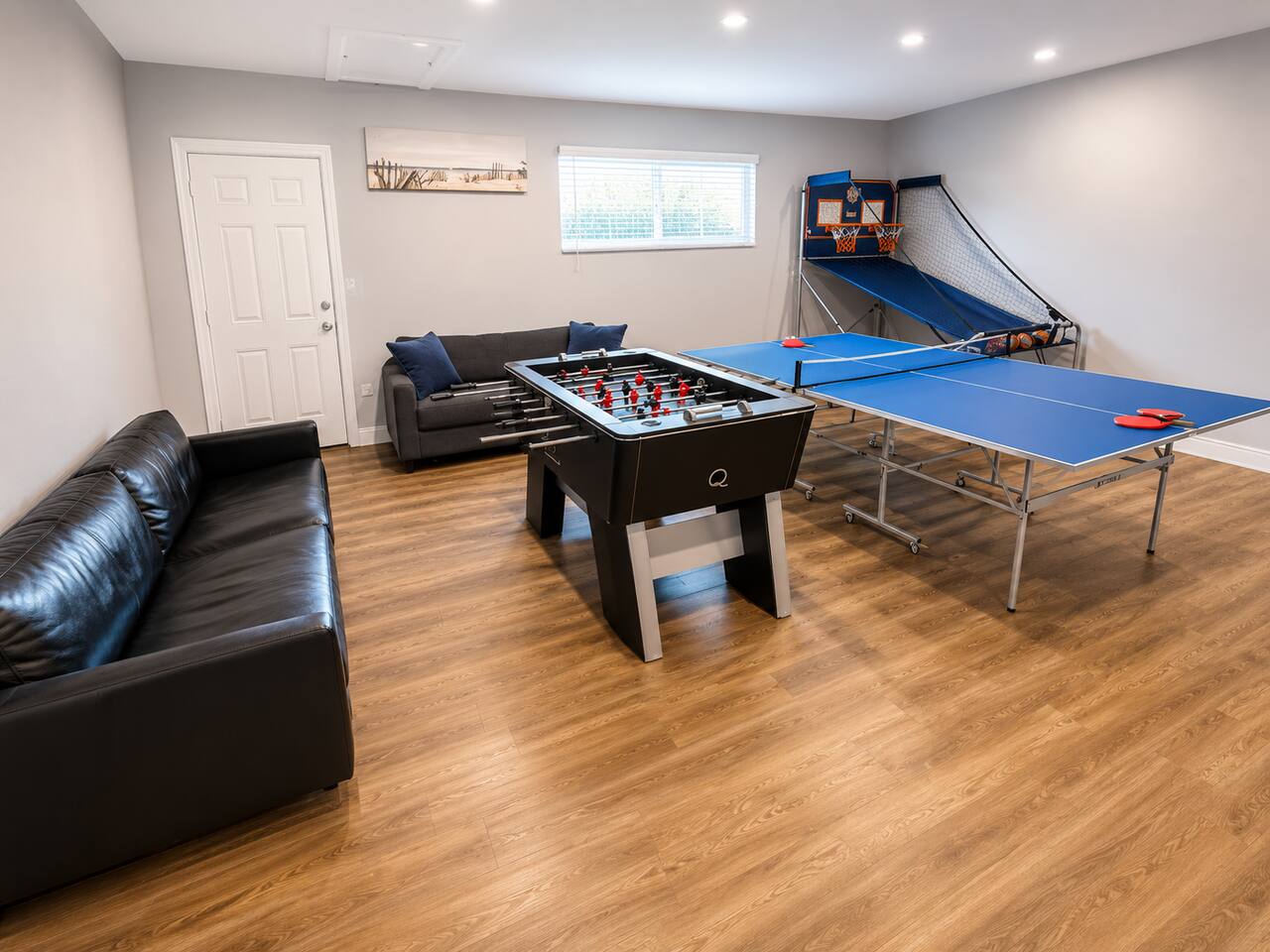 Bedroom 5 doubles as a fun game room, featuring indoor entertainment for guests of all ages. It's the perfect space to relax, enjoy friendly competition, and make lasting memories with family and friends.