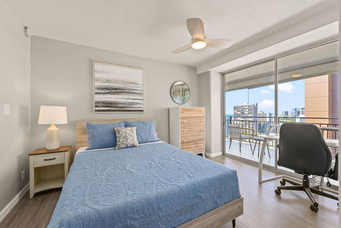 A dedicated workspace in this bedroom means you can catch up on emails without missing the ocean views!