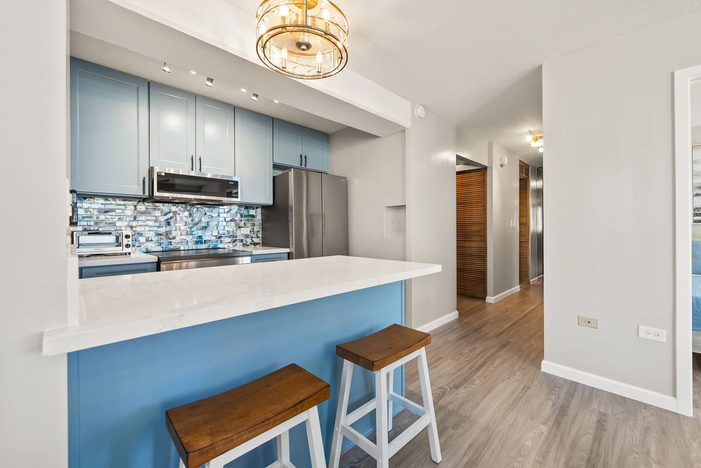 Gather around the kitchen bar to plan out your day of island adventures.