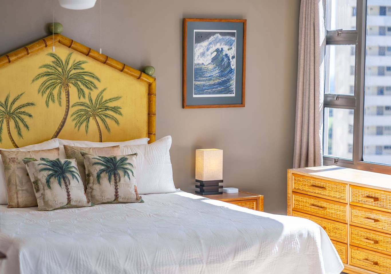 Get a restful night’s sleep in this spacious bedroom with the vibes to match your island getaway.