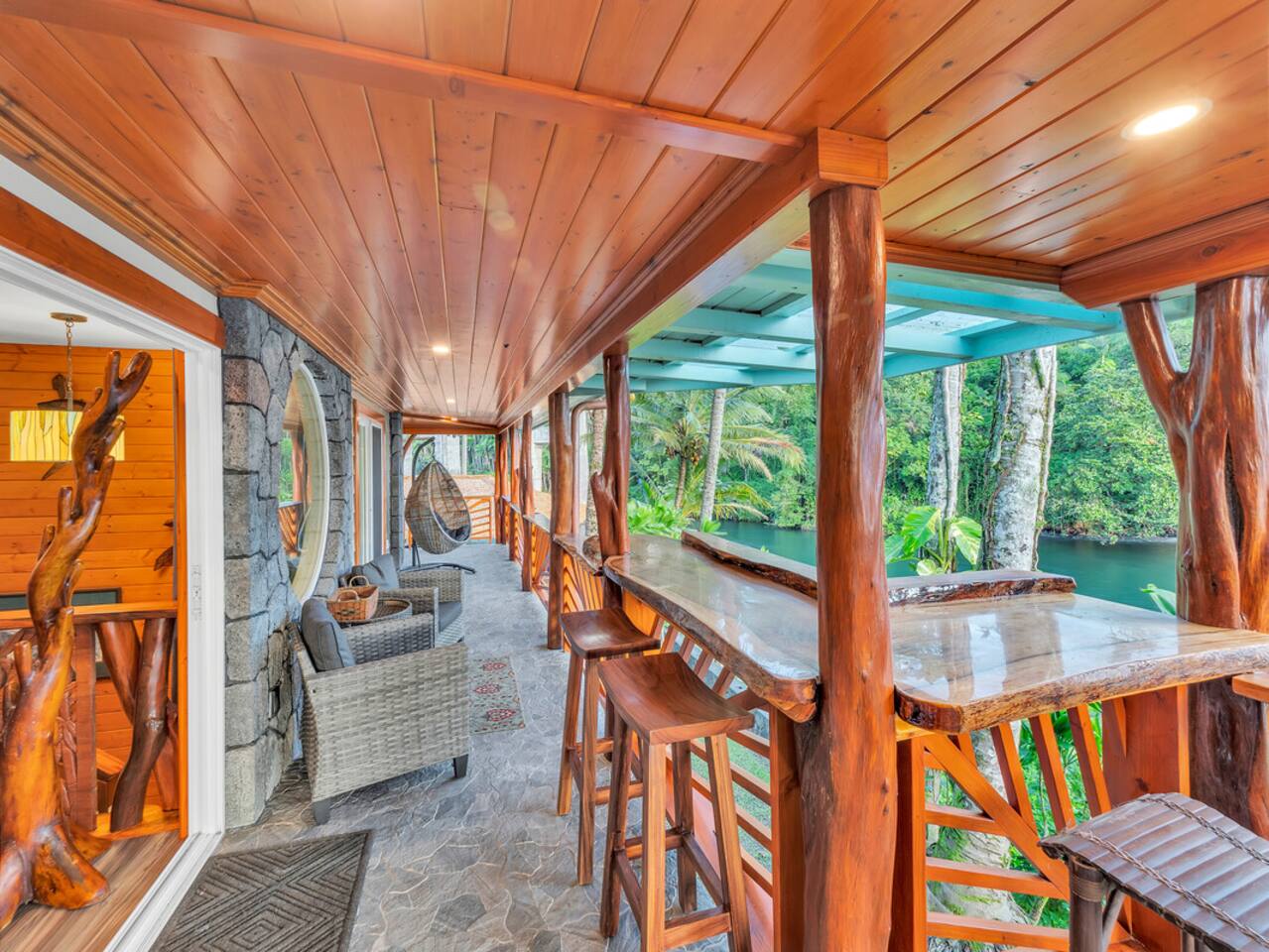 Whether you’re sipping coffee or dining al fresco, the wrap-around lanai offers unrivaled ocean and river views.