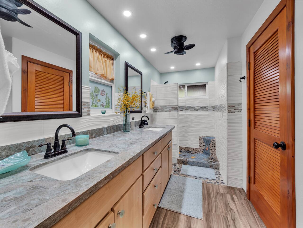 The dual-vanity upstairs master bath ensures plenty of space for everyone to get ready in style.