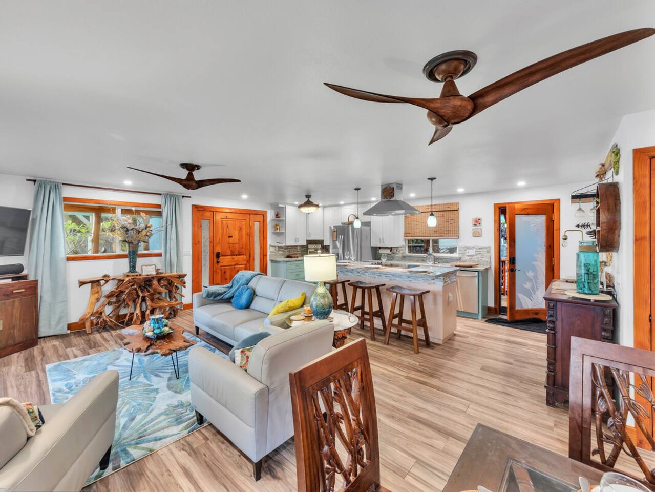 A welcoming space to unwind after a day of adventure, featuring island-inspired décor and sweeping ocean views.