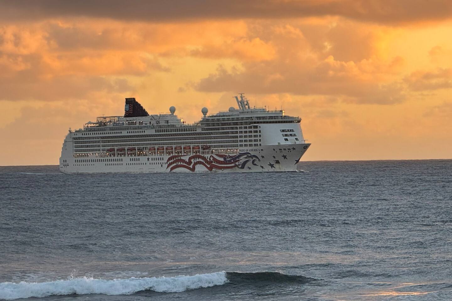 Watch as majestic cruise ships glide by at dusk and dawn, sailing in and out of Hilo Bay