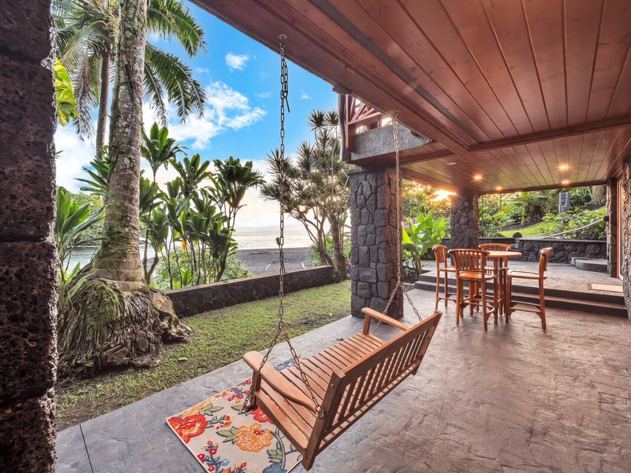 The hanging chain bench swing on the lanai is the perfect spot to relax and take in the view.