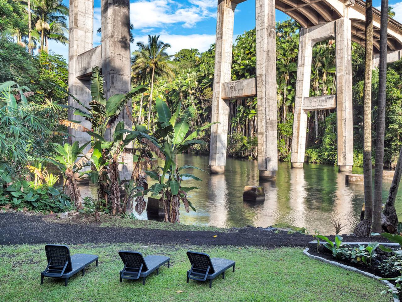 The lower lawn leads directly to the Honoli'i Stream, providing a peaceful spot to relax.”