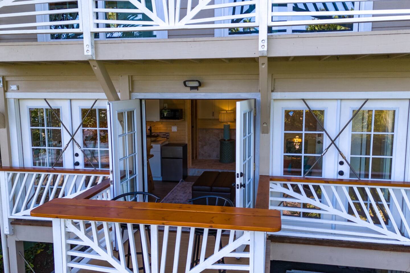 With the suite's private entrance and serene atmosphere, it's an ideal spot to recharge, with easy access to the vibrant beach below.