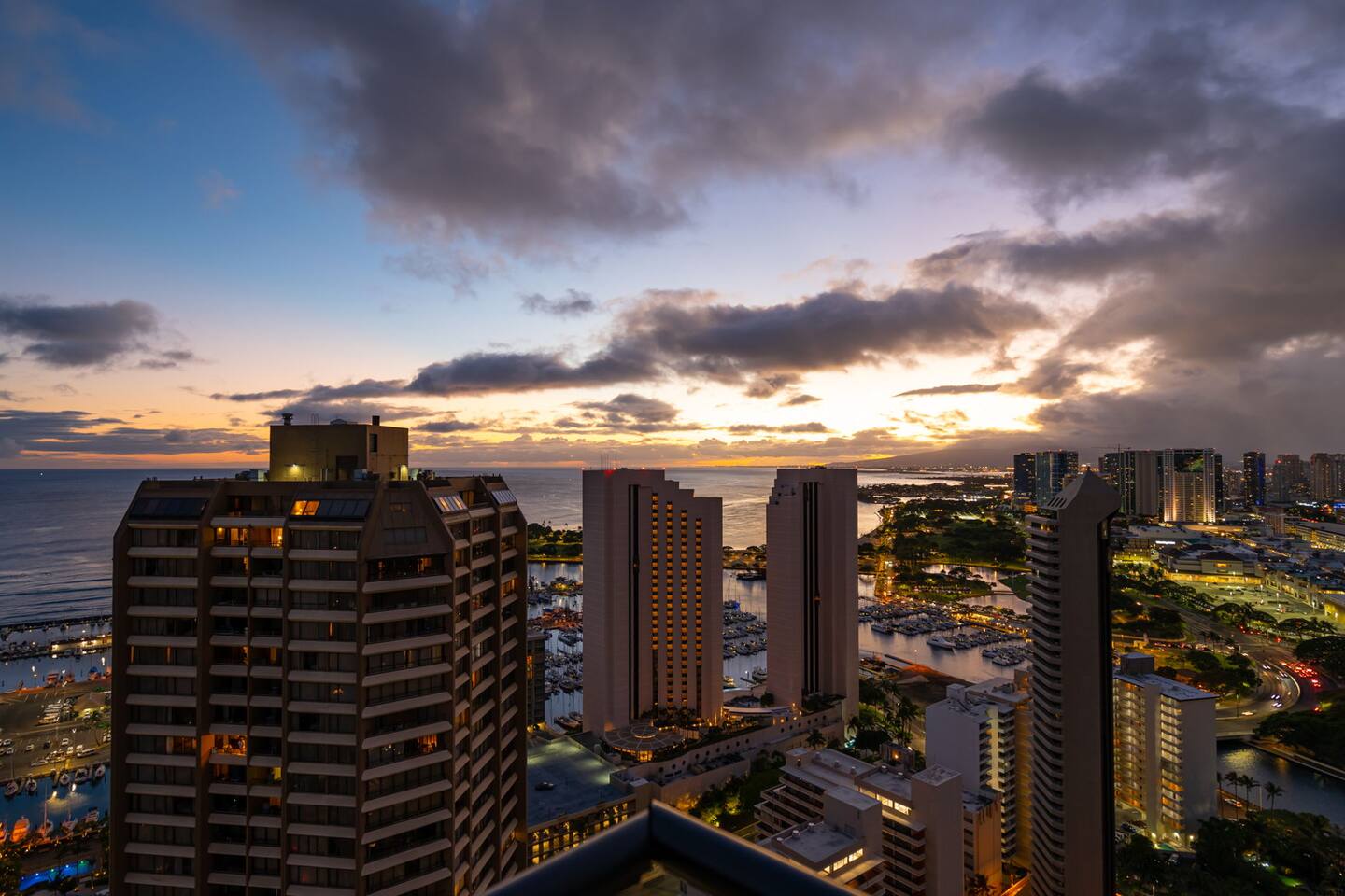 As the sun sets and the lights of Waikiki twinkle on, the terrace offers a serene view—perfect for a quiet evening watching the colors change over the city and ocean.