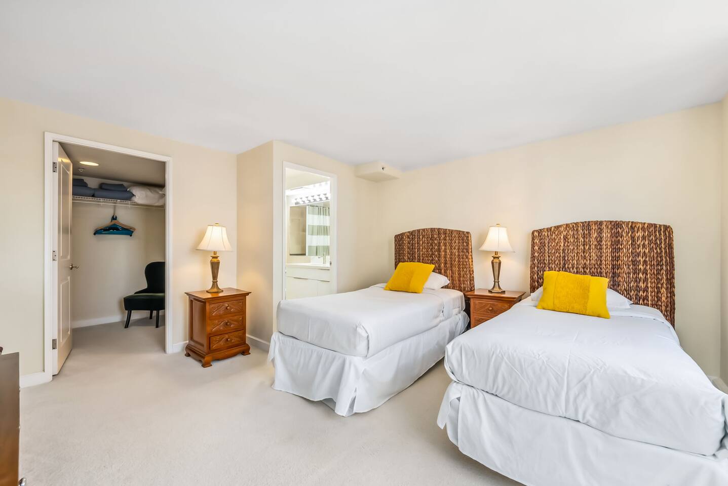 This suite features two twin beds that can be pushed together to create a king, a spacious walk-in closet, and a private en-suite bathroom.