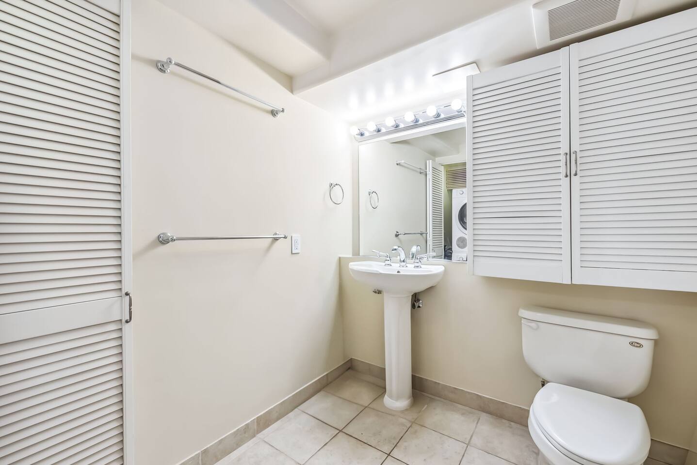 Located on the upper level, the half bath offers easy access for guests, ensuring convenience throughout your stay.