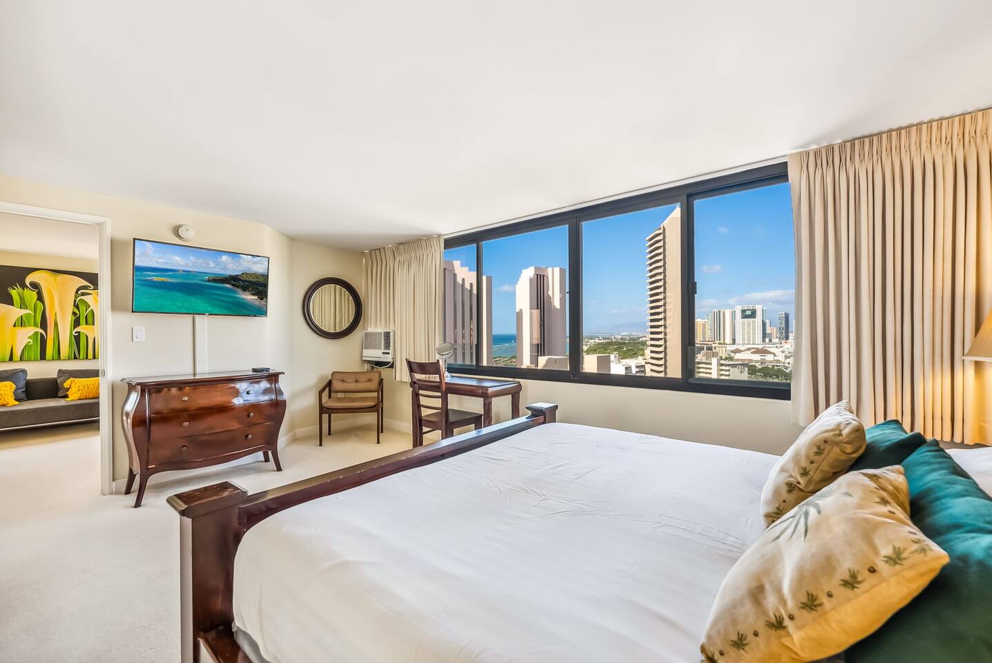 Wake up to ocean views in this beautiful master suite, complete with a king bed, a 43" smart TV, and a desk for working or getting ready.