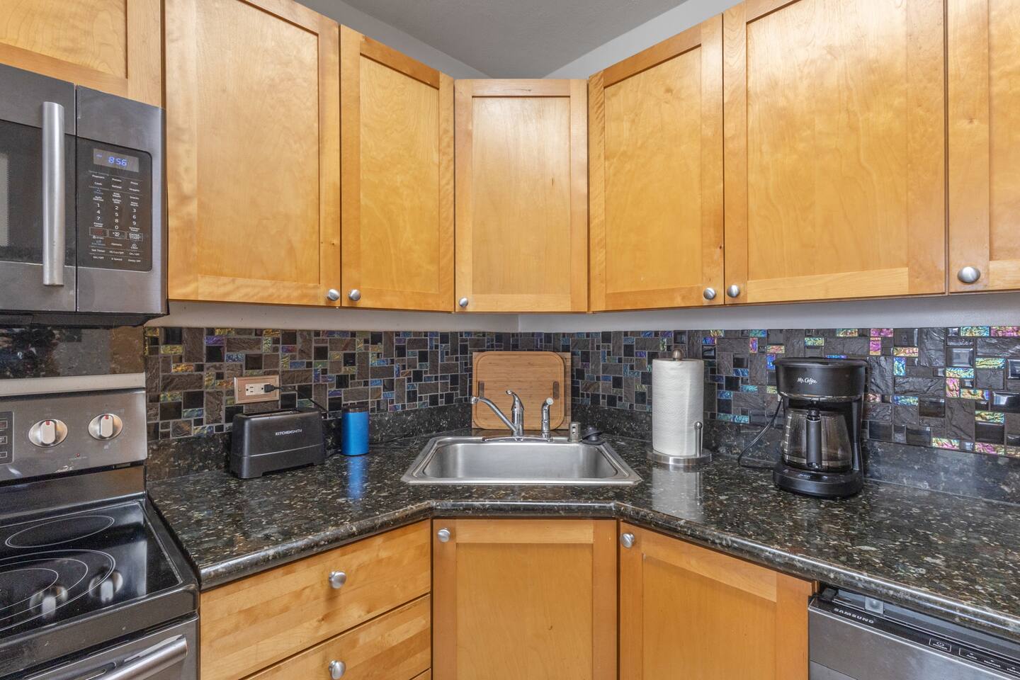 You'll find essential utensils and appliances in the kitchen. Among them, a drip coffee-maker for your morning brew!