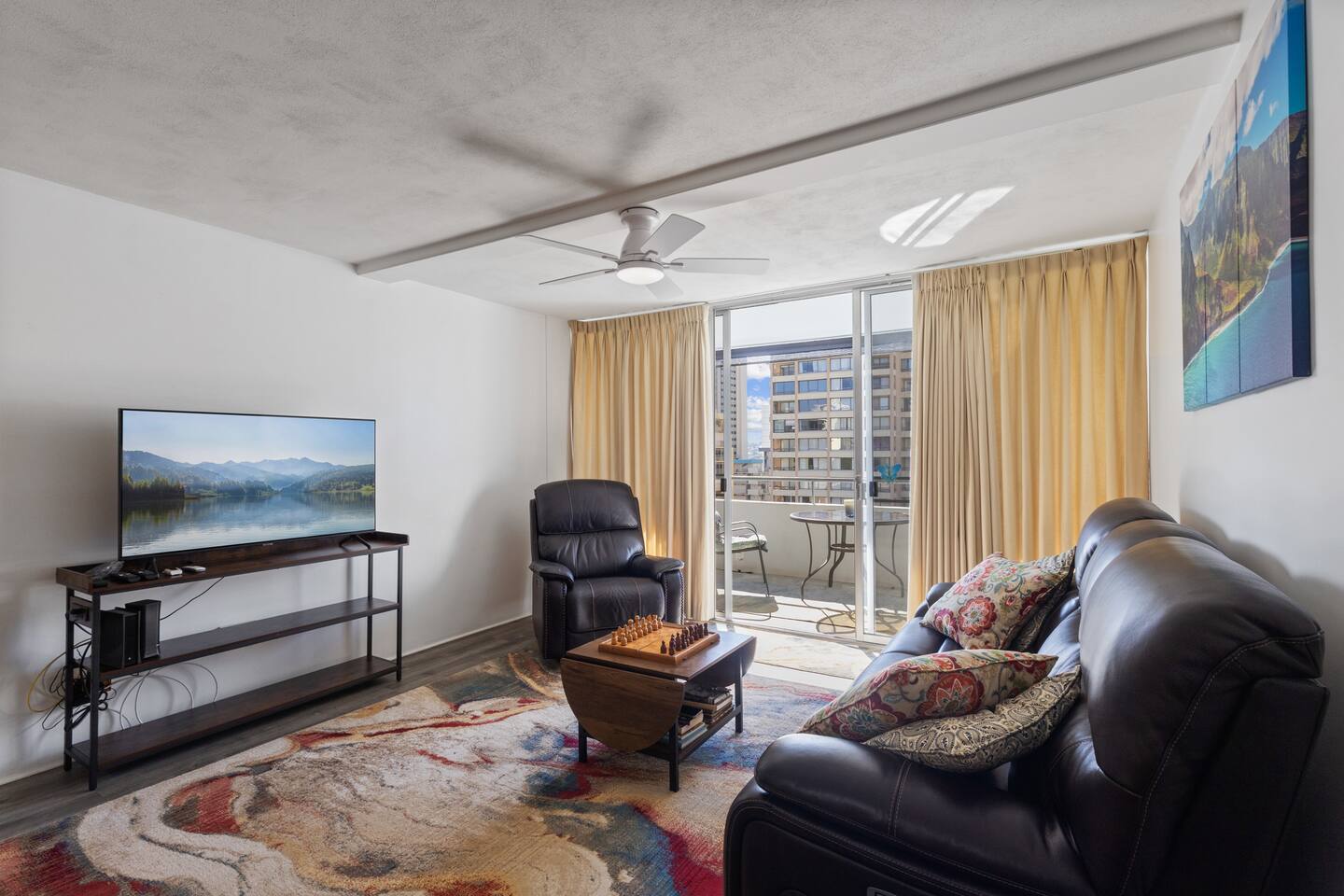 Settle into a warm, cozy atmosphere with comfortable furnishings and thoughtful touches-your ideal home away from home in Waikiki.
