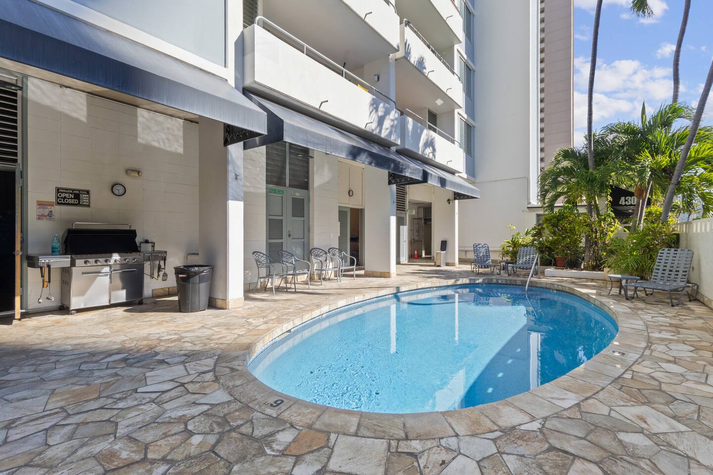 After a day at the beach, unwind with a refreshing dip in the building’s private pool.