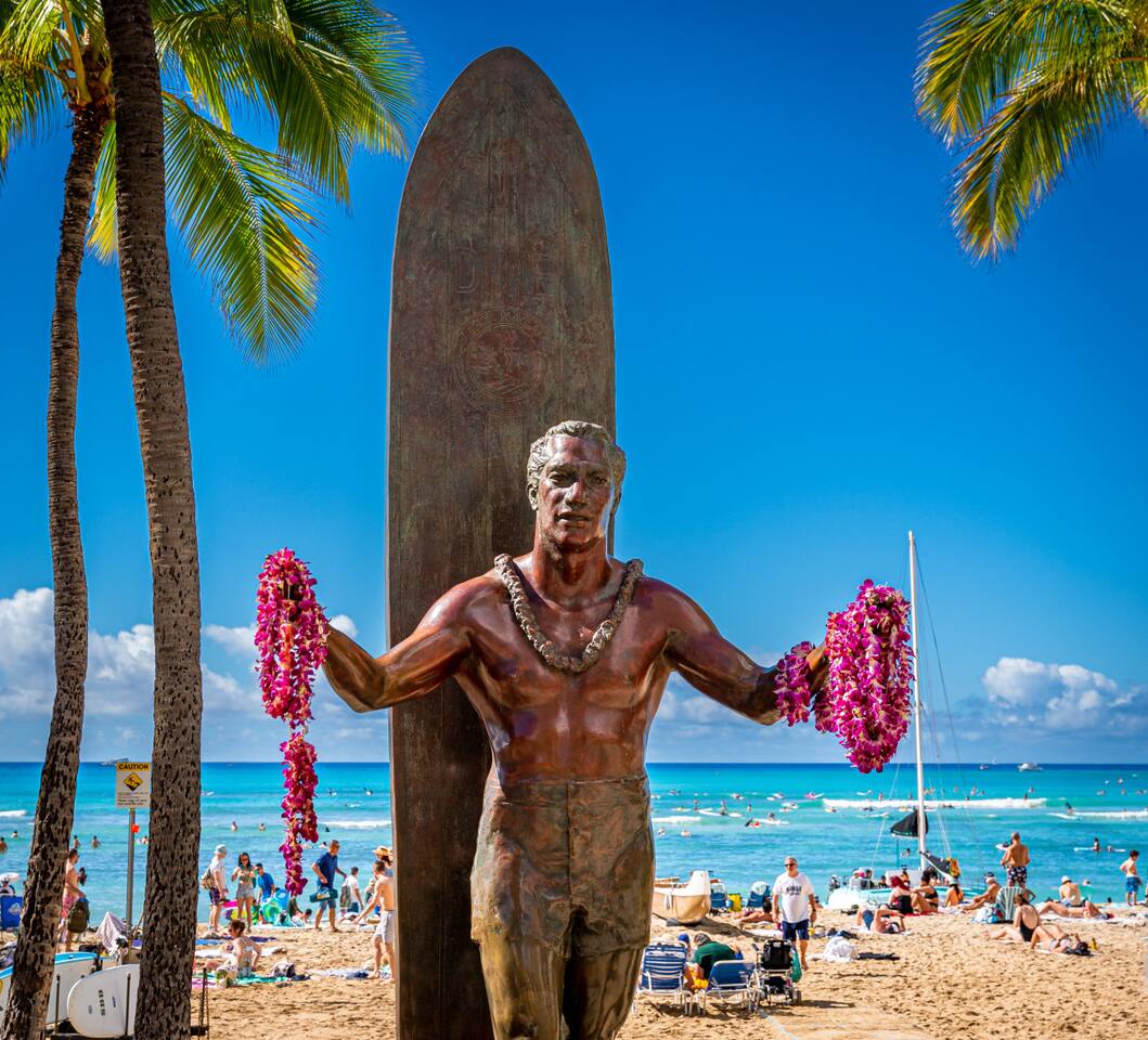 Visit the iconic statue of surfer Duke Kahanamoku on Waikiki Beach.
