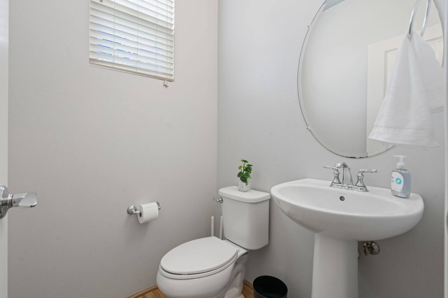Convenient downstairs half bathroom-perfect for guests and everyday ease.