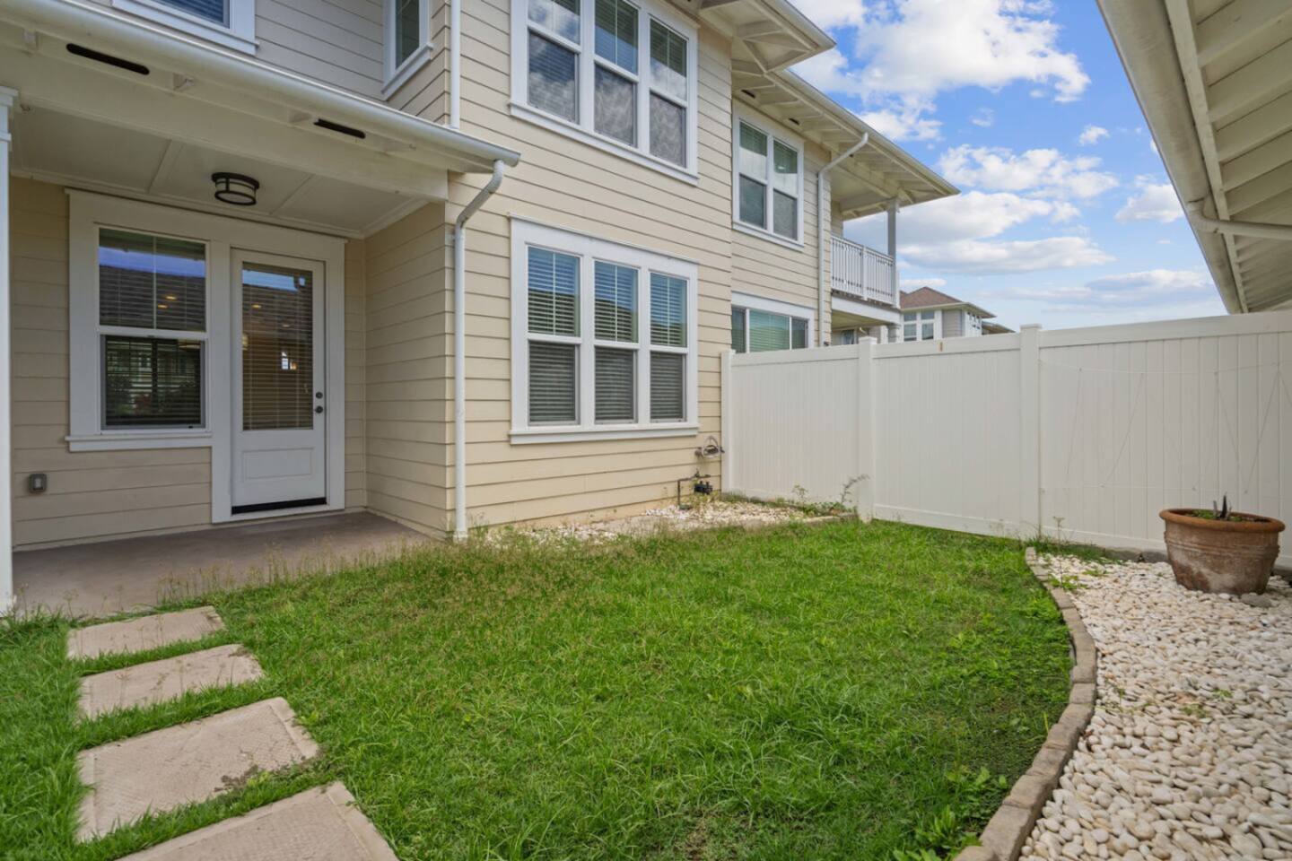 Private backyard that's perfect for relaxing outdoors or enjoying a bit of extra space to relax.