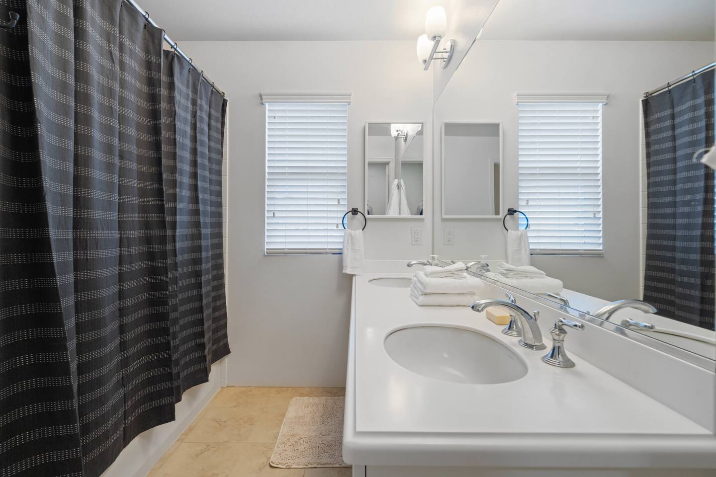 Spacious en-suite bathroom featuring a double vanity-perfect for added convenience during busy mornings.