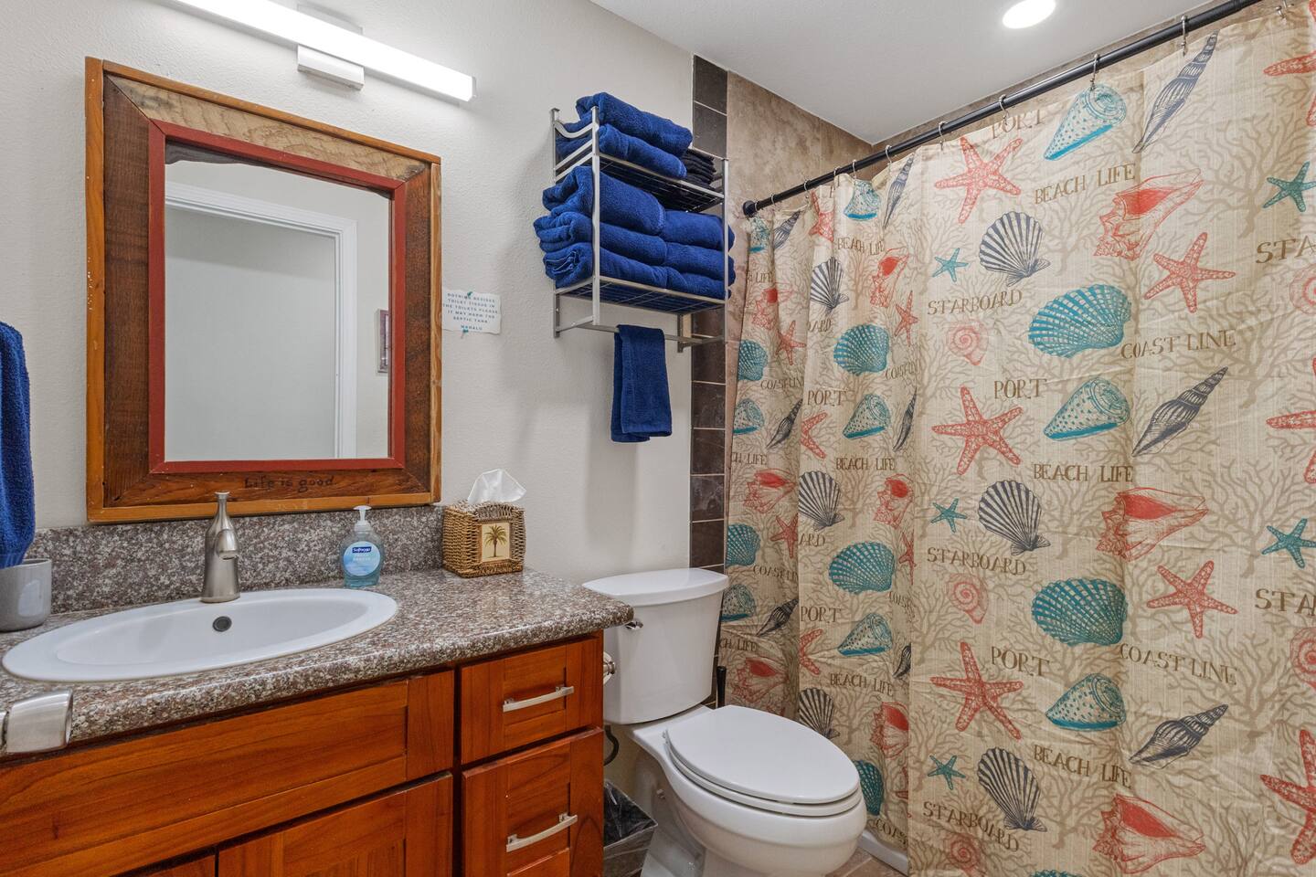 From starfish to soft towels, this cheerful bathroom is a refreshing retreat for the whole crew.