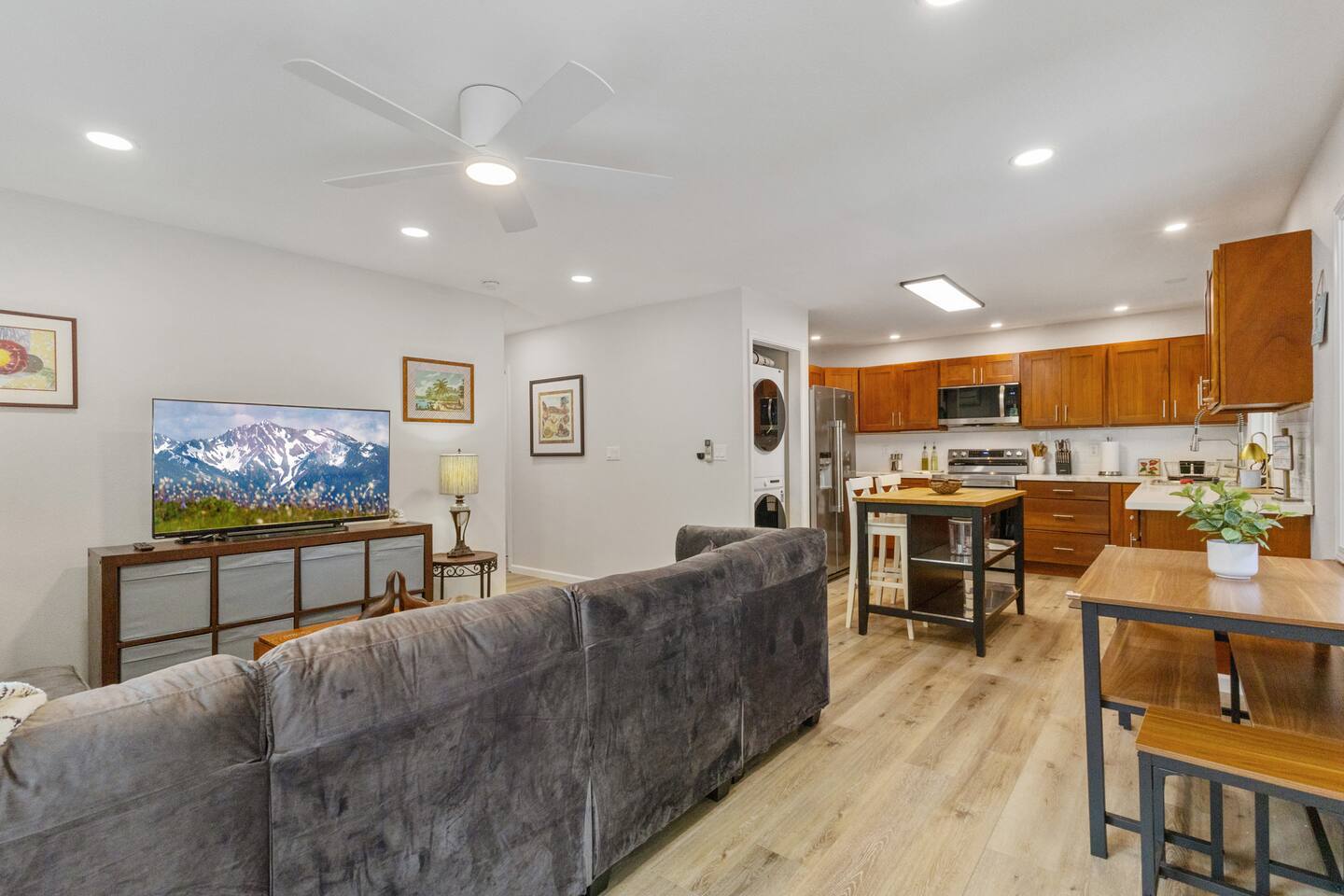 Open-concept living and kitchen area is perfect for cooking while enjoying company.