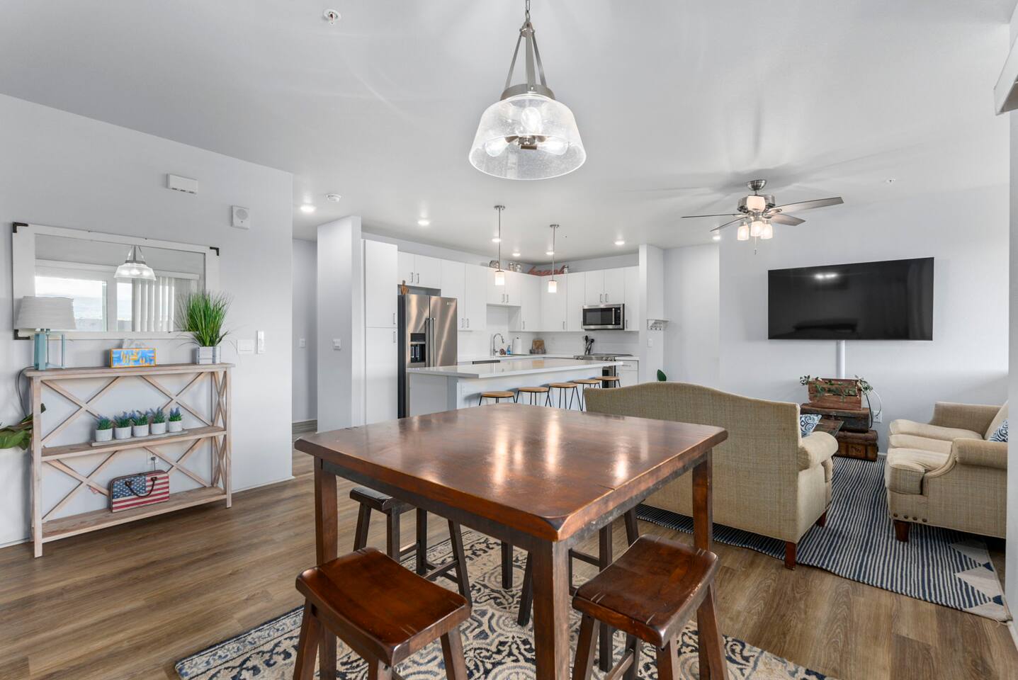 Bright open-concept living and dining area with modern décor-perfect for relaxing or entertaining.
