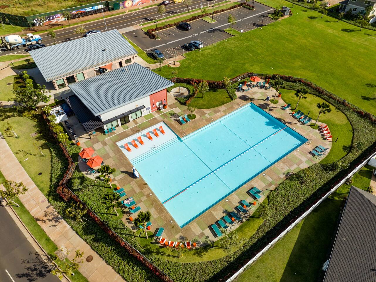 Dive into vacation mode in this expansive pool area, your family’s splash zone for sun and fun!