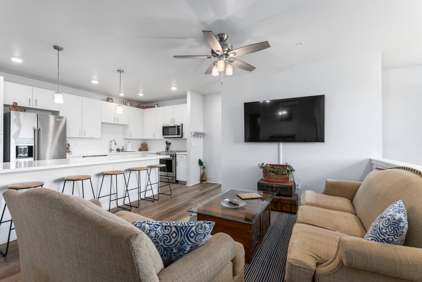 Cook dinner while watching your favorite show on our 65 inch TV!