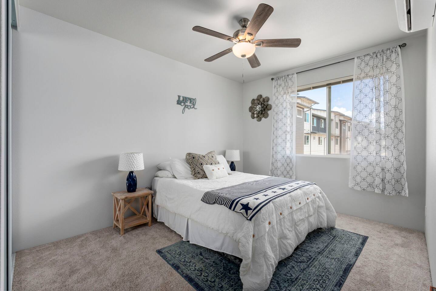 Soft sheets, warm light, and peaceful vibes-this bedroom is your cozy escape.