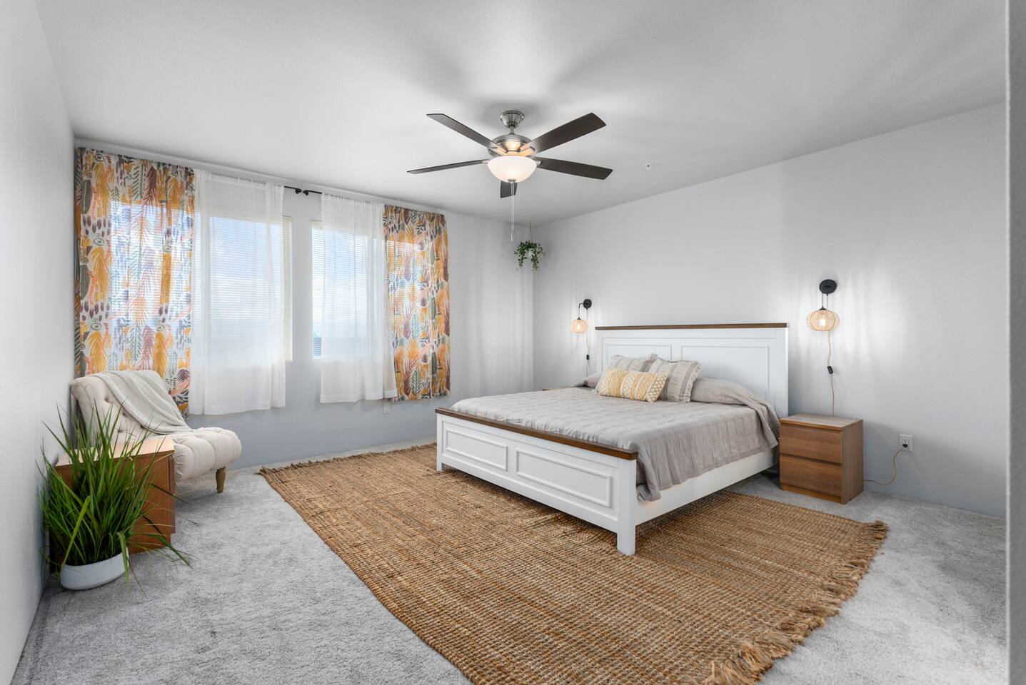 The master bedroom features a king bed and the coastal vibes to match your vacation.