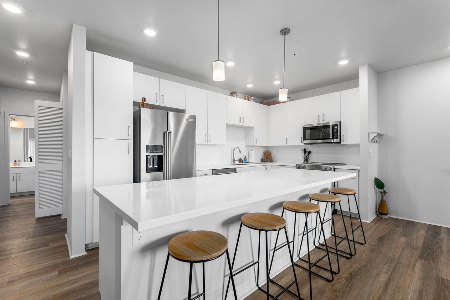 The kitchen island is perfect for food prep, or buffet style breakfast on a Saturday morning.