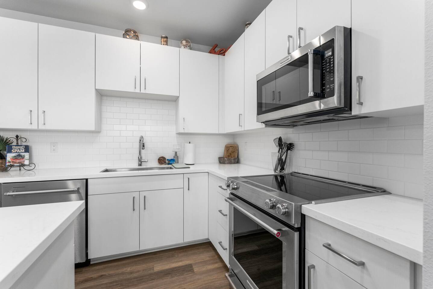 This modern kitchen features stainless steel appliances, where you can chef your way.