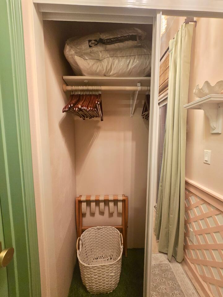 Clean, simple, and ready for your stay this closet offers comfort and convenience in every detail.