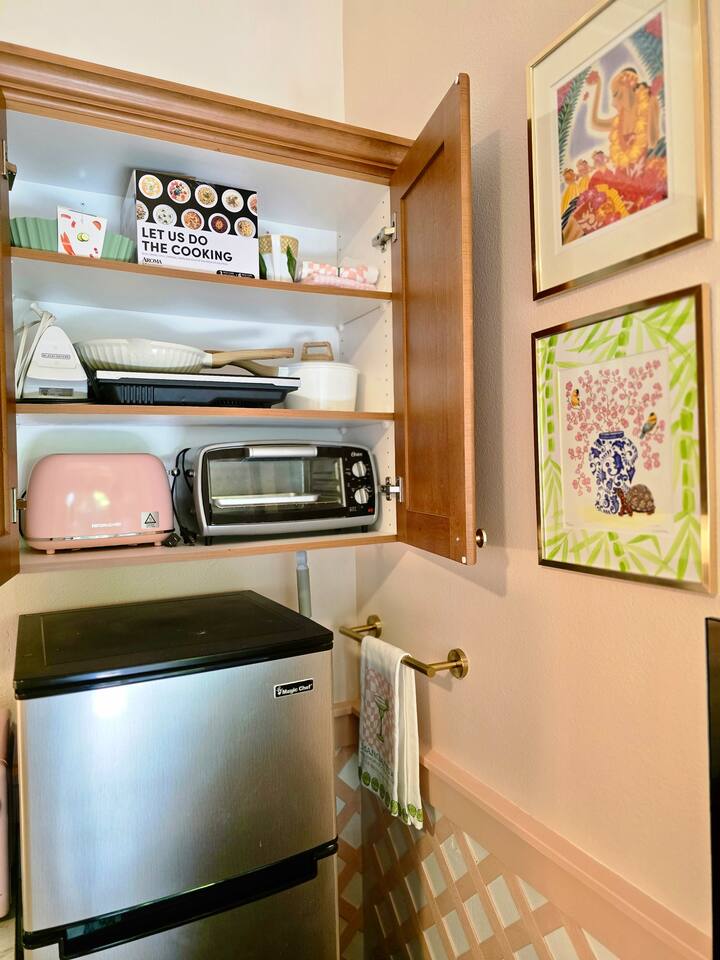 Compact and cheerfulthis kitchenette is stocked with essentials and a dash of personality.