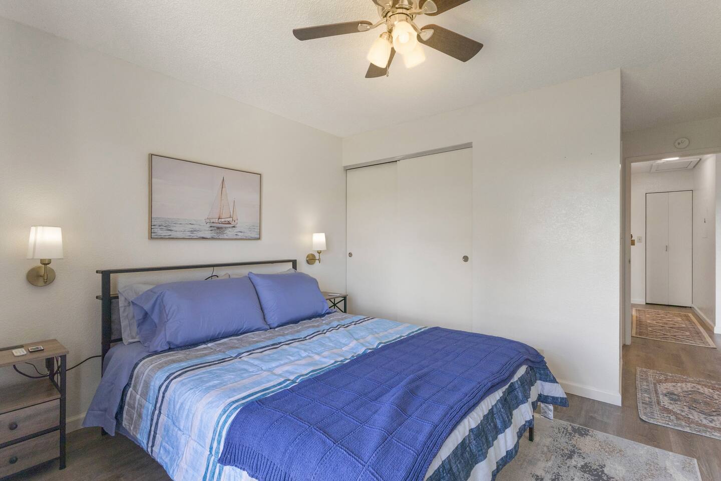 With soft lighting and a nod to the sea, this bedroom is your personal harbor after a day of adventure.