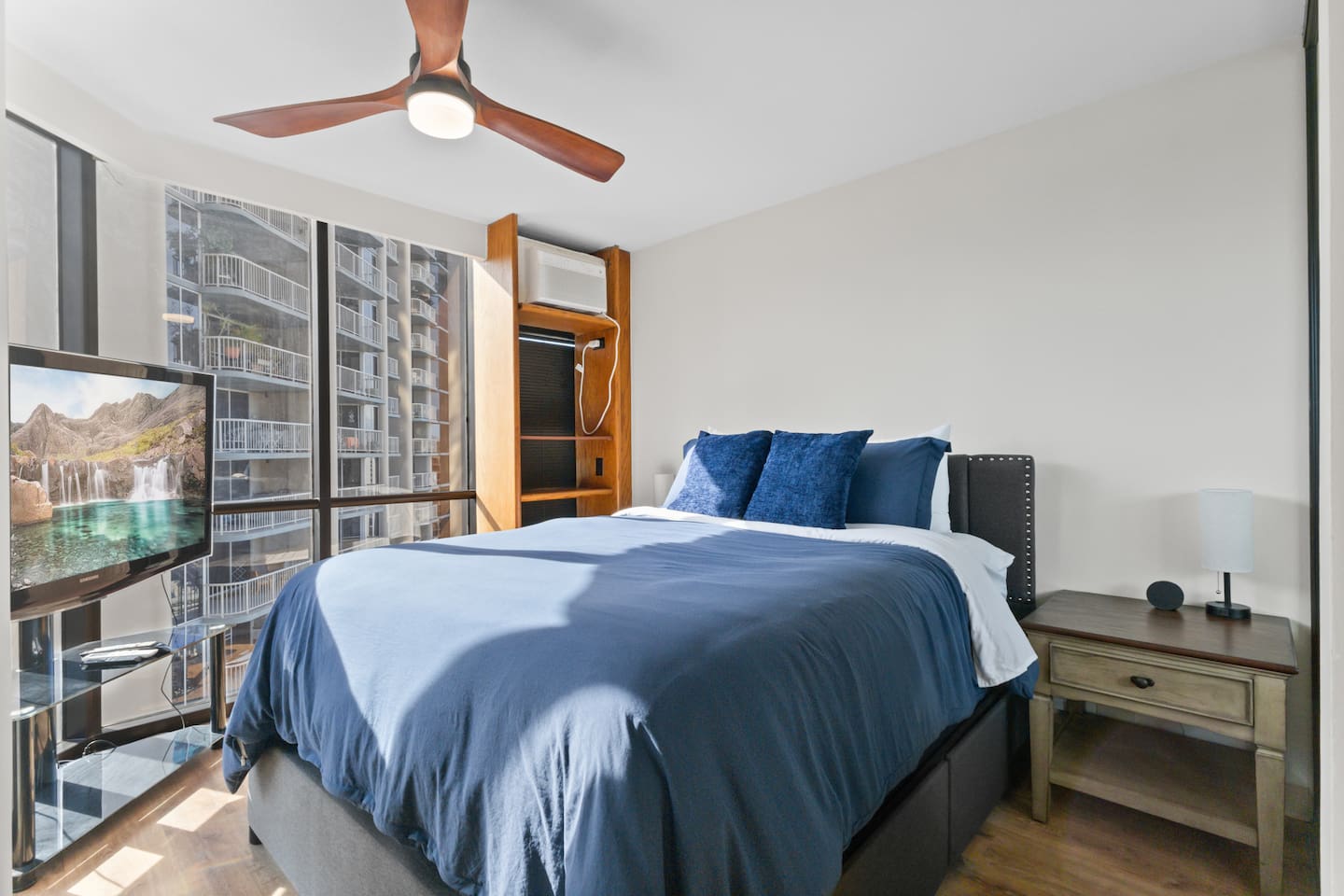 Get comfortable in plush pillows and peaceful panoramic views right from your bed.