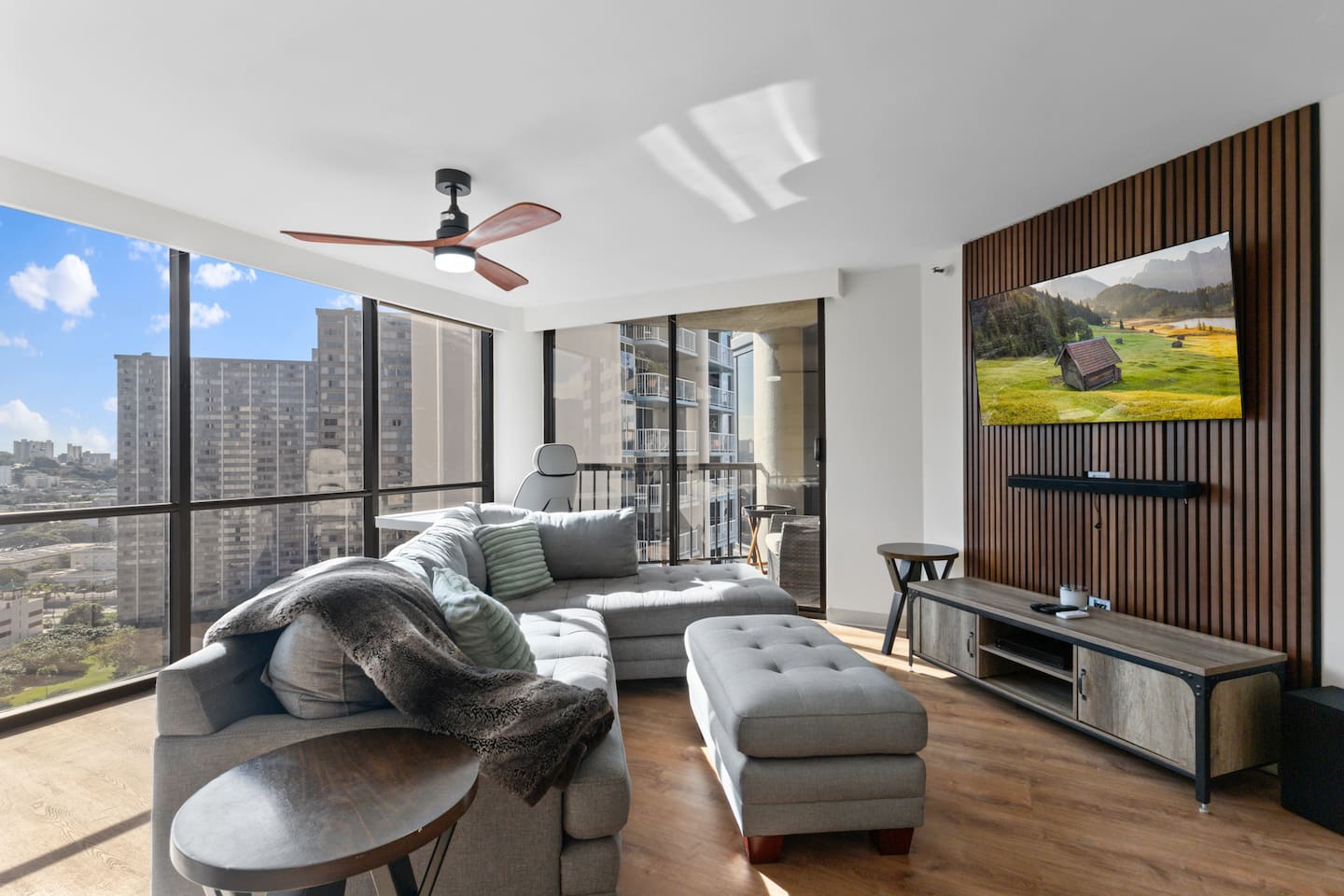Let the light pour in while you unwind in this modern retreat, where comfort meets panoramic charm.