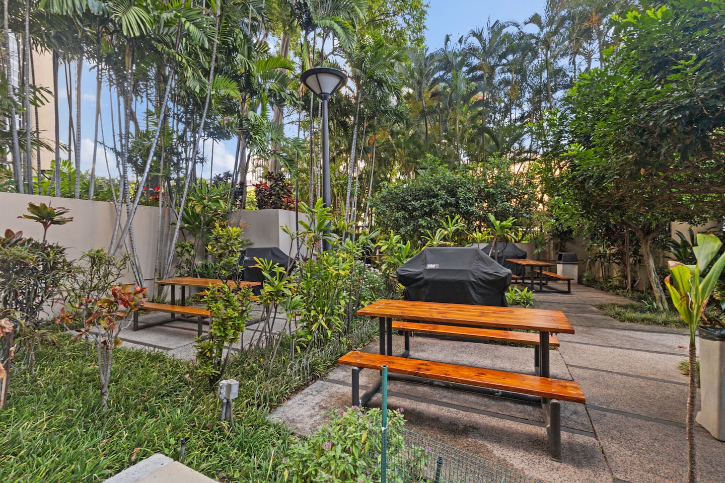 Island living at its best! Communal BBQs, plenty of seating, and a peaceful garden vibe just steps from your door.