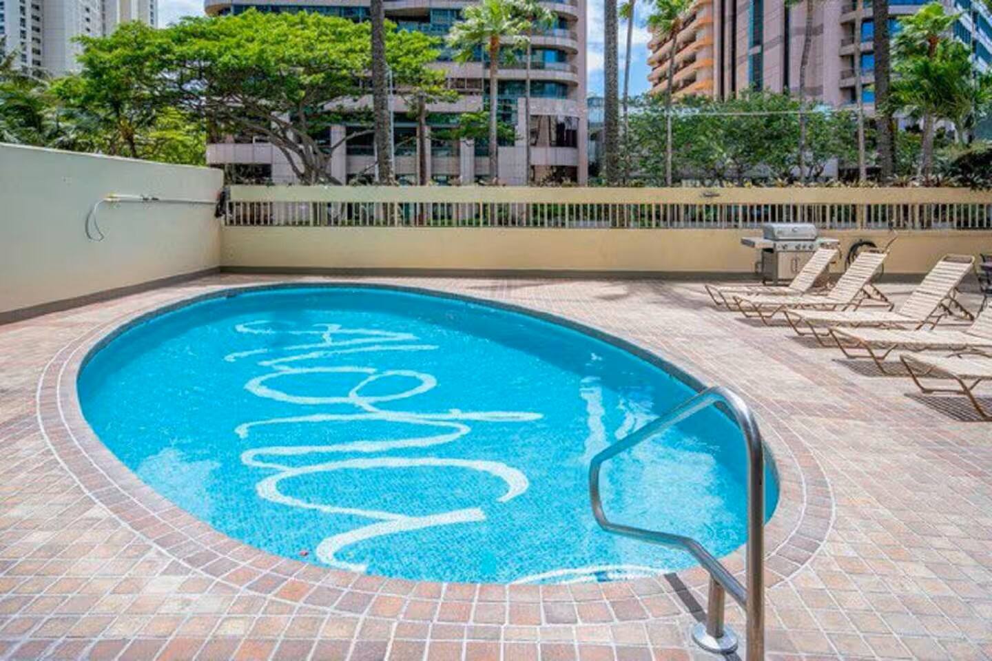 Whether you're swimming, sunbathing, or firing up the BBQ, this outdoor space is your island escape.
