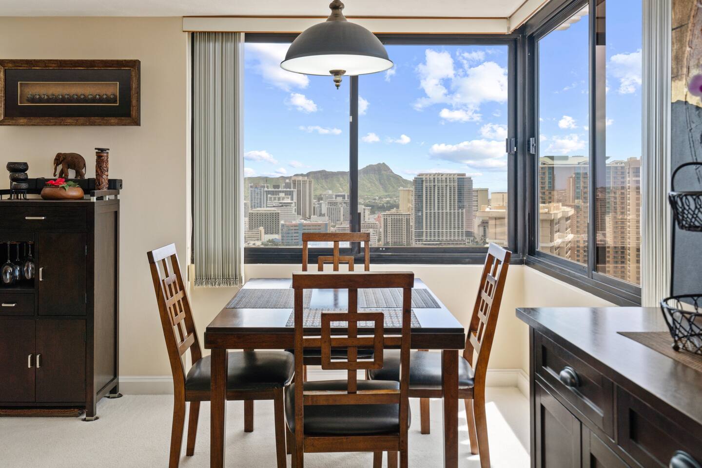 Morning light, mountain backdrop, city buzz. Your coffee tastes better here. Honolulu living at its finest.