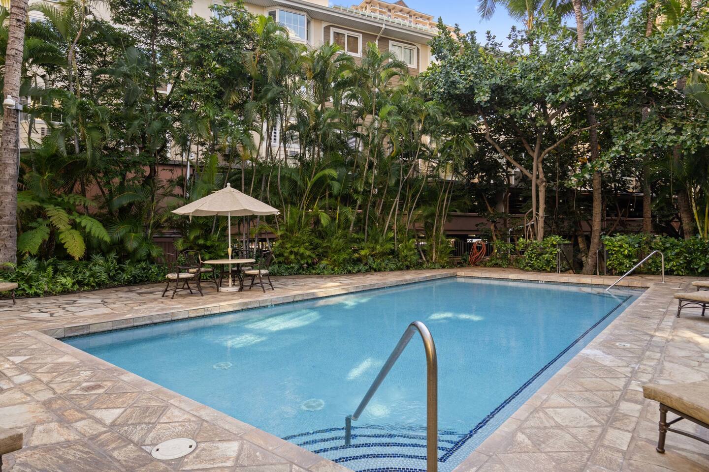 Lounge, dip, repeat. Surrounded by tropical greens and sunshine. Your private slice of paradise.