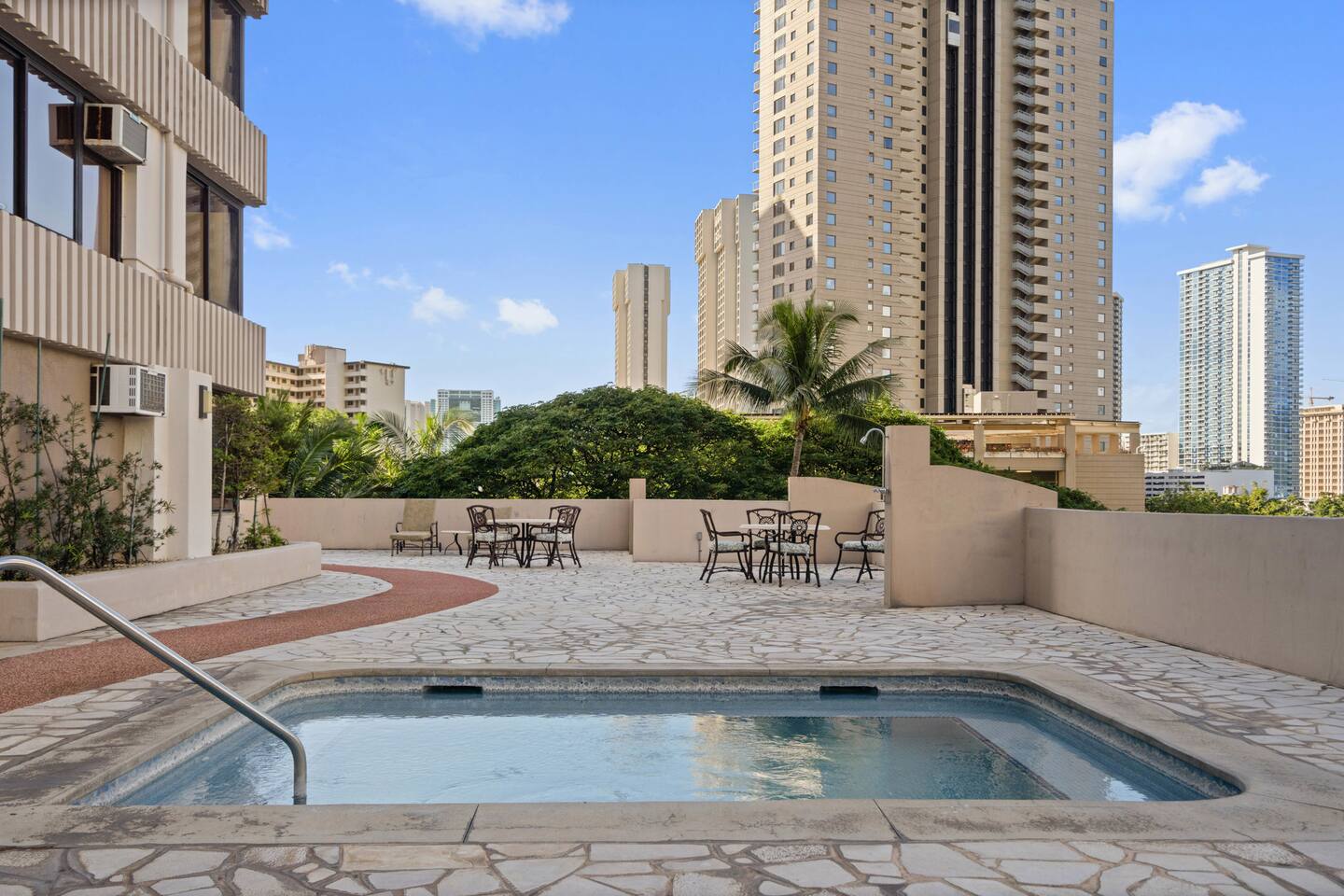 Urban edge meets island ease. Swim, sun, and soak it all in. This terrace pool is pure escape.
