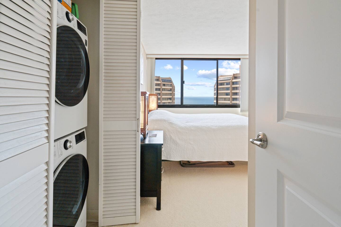 Ocean views from bed, laundry just steps away. Smart space, breezy mornings, island ease. Everything you need, right where you want it.
