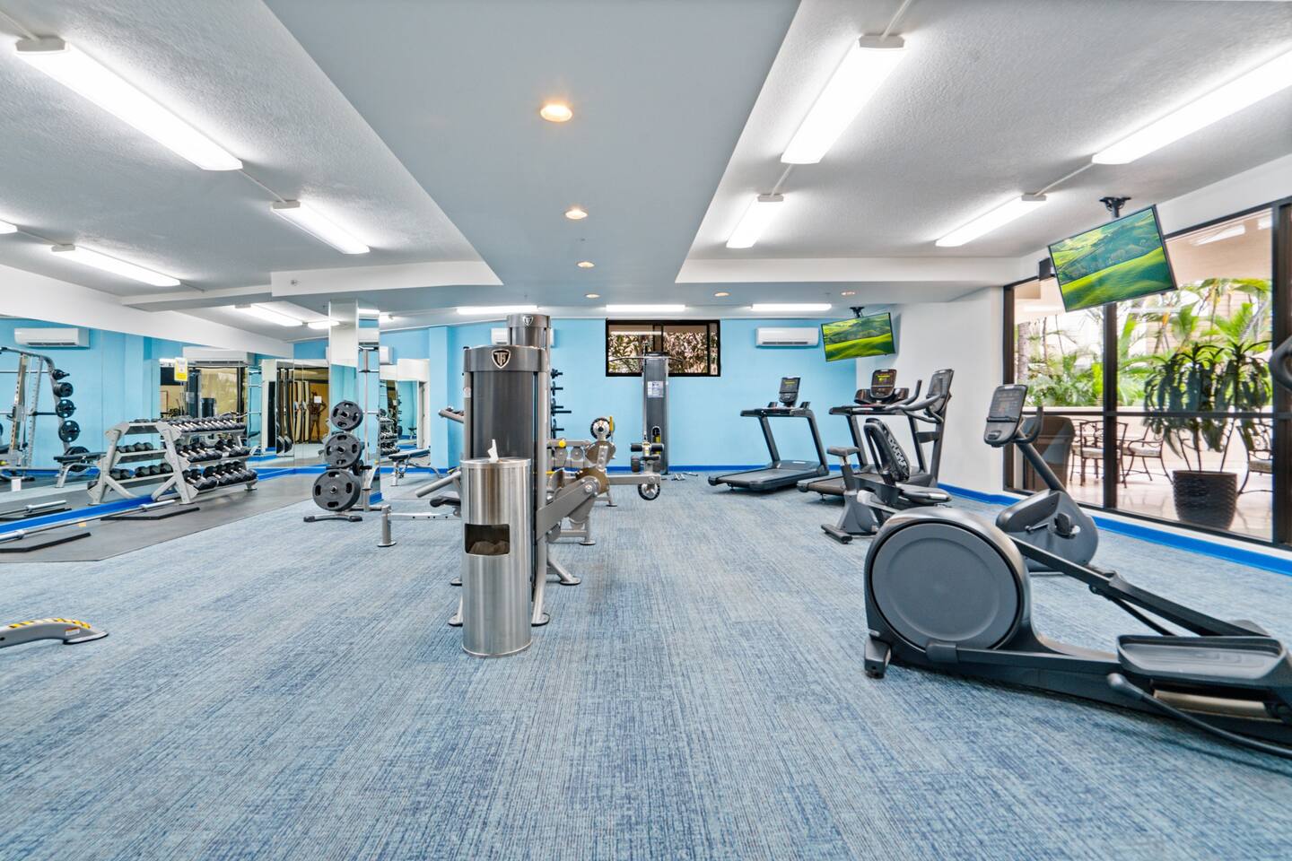Strength, cardio, and coastal calm. This workout zone keeps you energized. Fitness with a view.