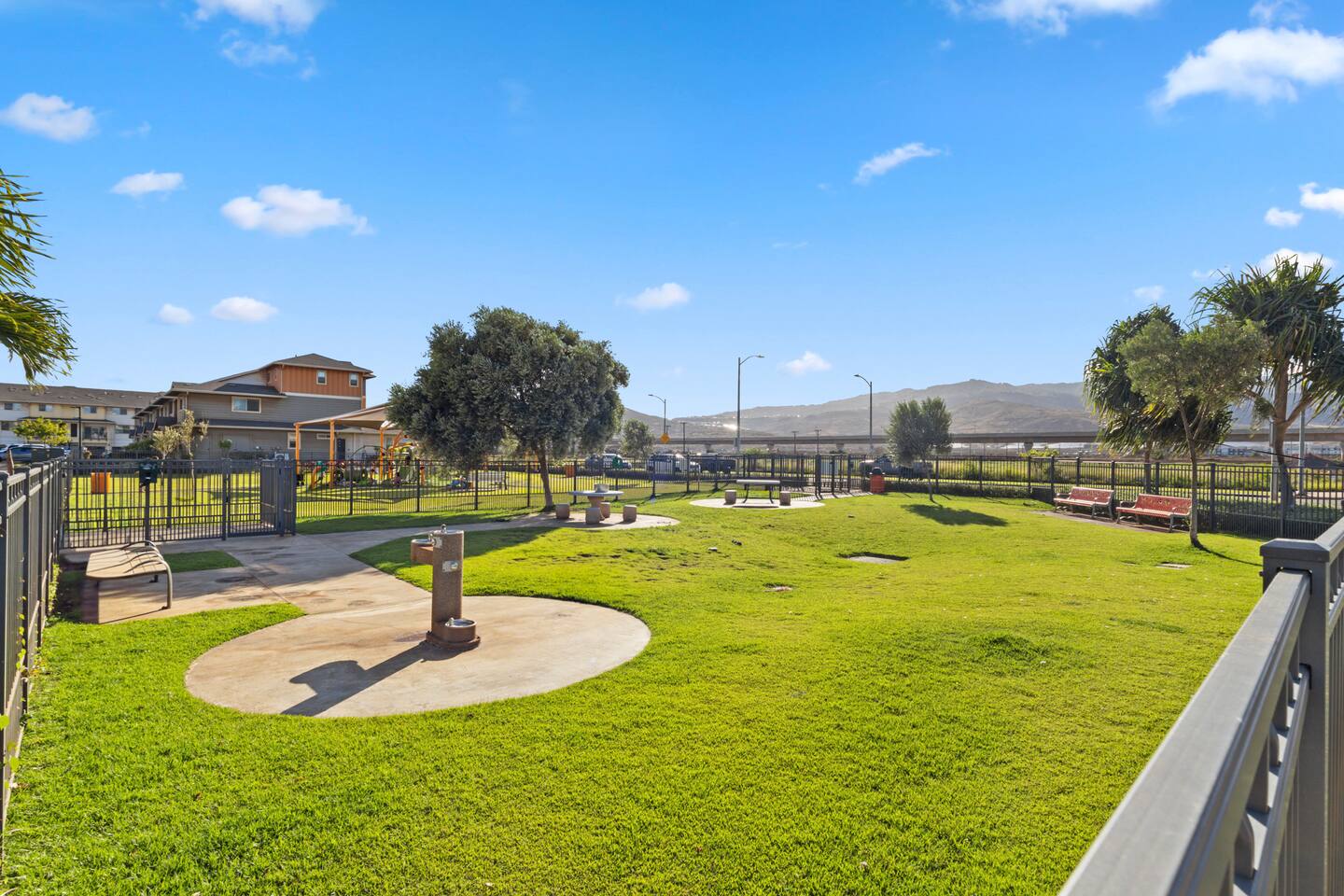Stretch out under blue skies or gather by the fountain , this green space is made for peaceful moments.