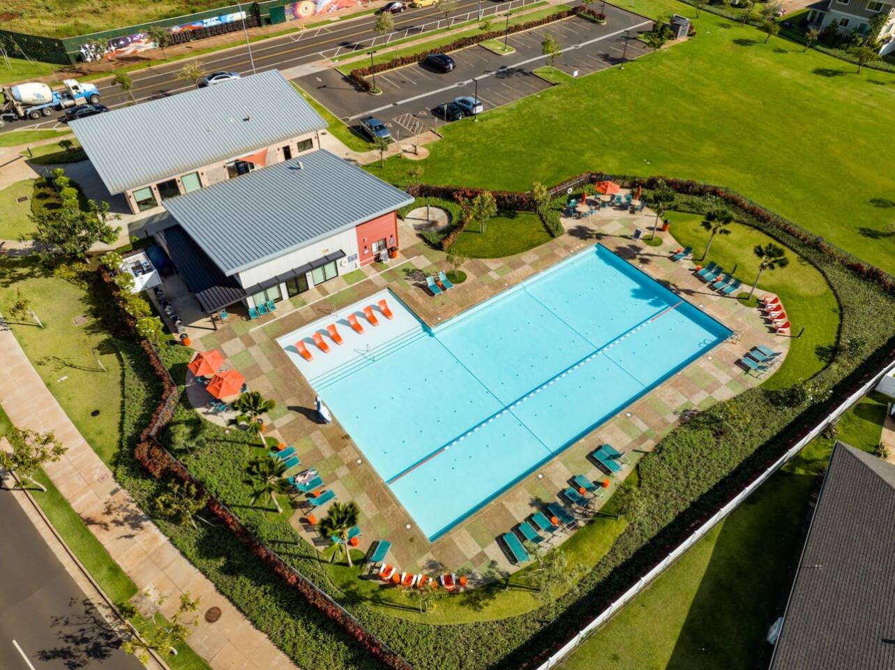 Swim laps, lounge under umbrellas, or enjoy the palm-lined deck this facility blends fitness with leisure.