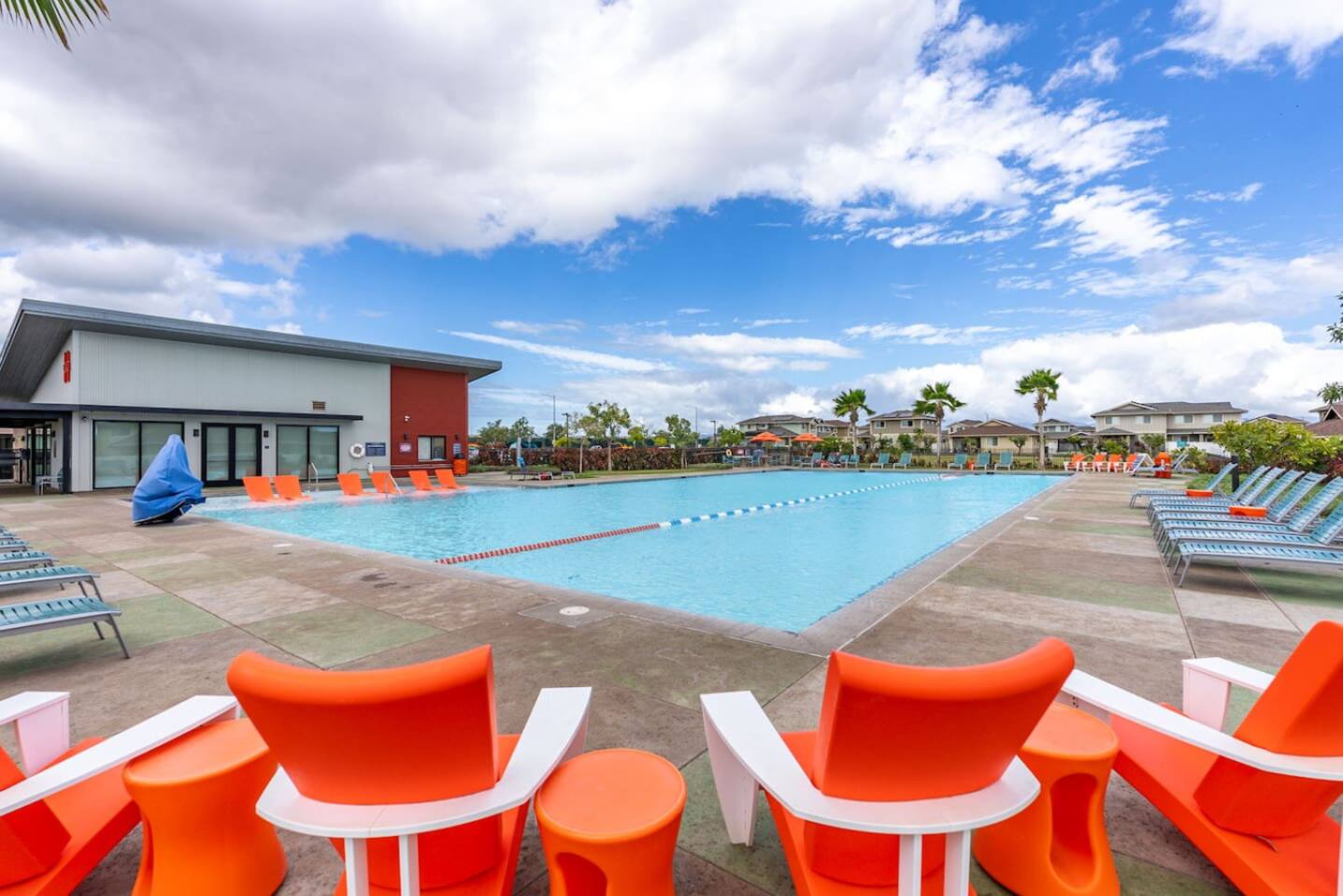 Whether you're swimming laps or lounging poolside, this outdoor space offers sunshine, seating, and resort-style calm.