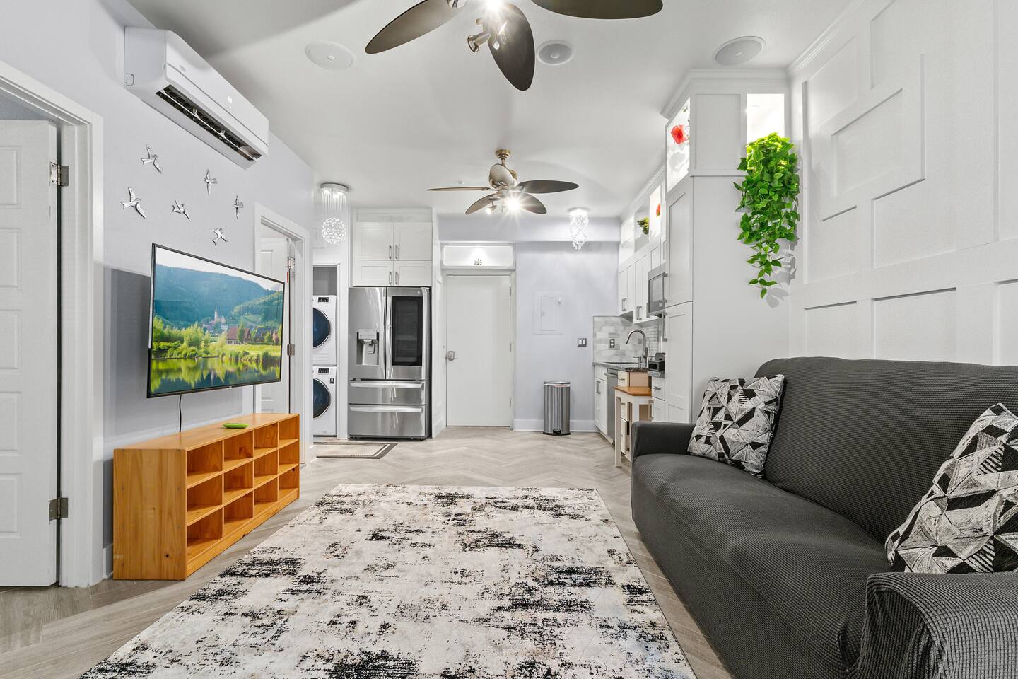Bright, functional layout with sleek appliances, cozy seating, and everything you need within reach.