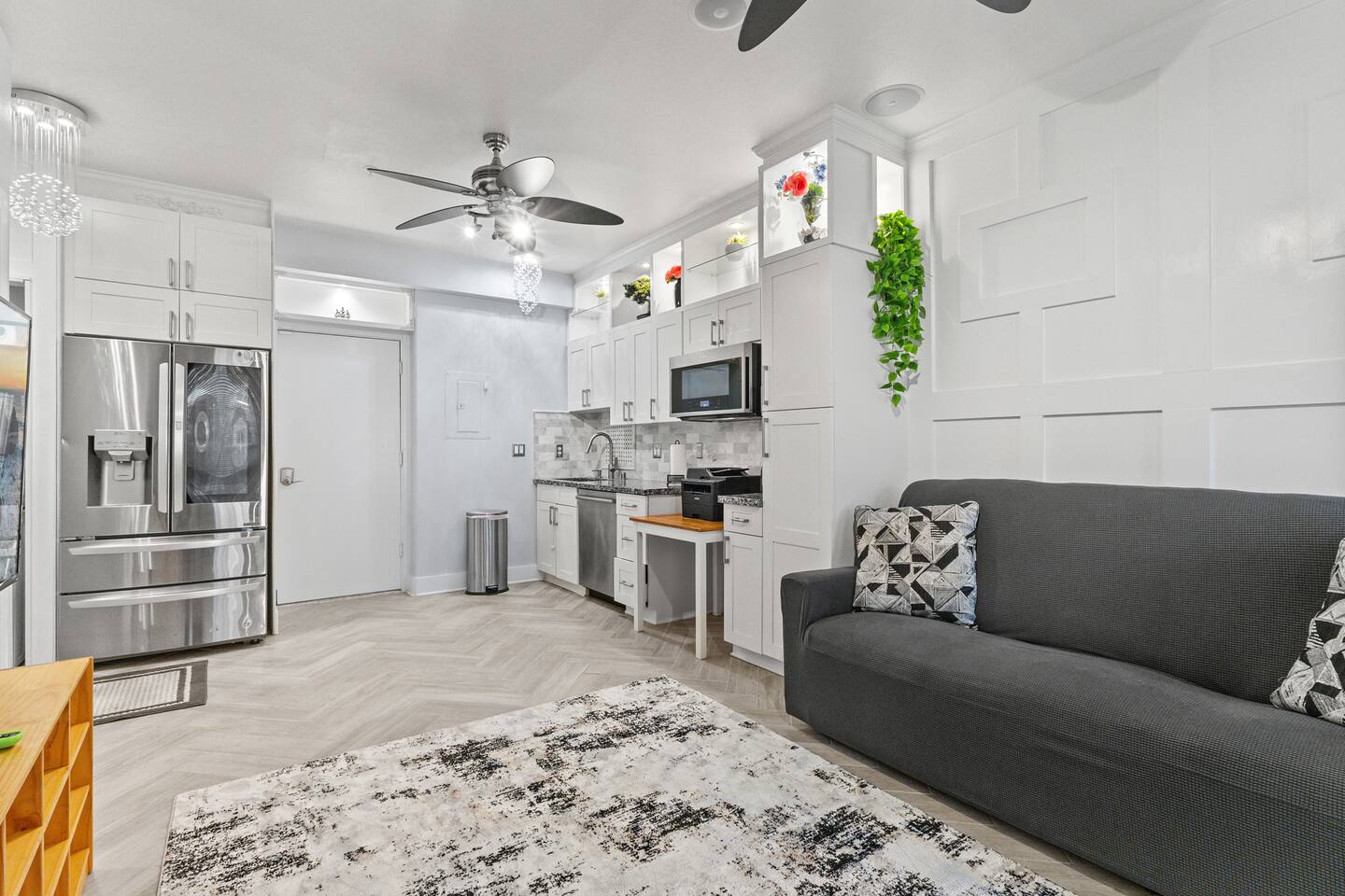 Start your day with sunlight and fresh coffee, then unwind in this thoughtfully designed kitchen-living combo.
