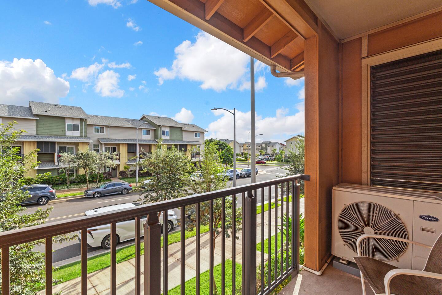 Step outside for fresh air and neighborhood views ,this balcony offers a quiet perch above tree-lined streets.